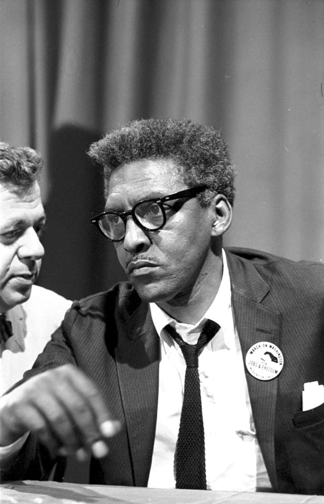 Bayard Rustin at a 1963 news briefing on the March on Washington