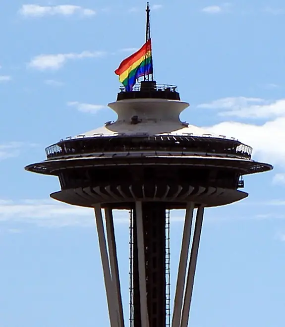 The Space Needle in Seattle flying a rainbow Pride flag at half-mast for the Orlando victims